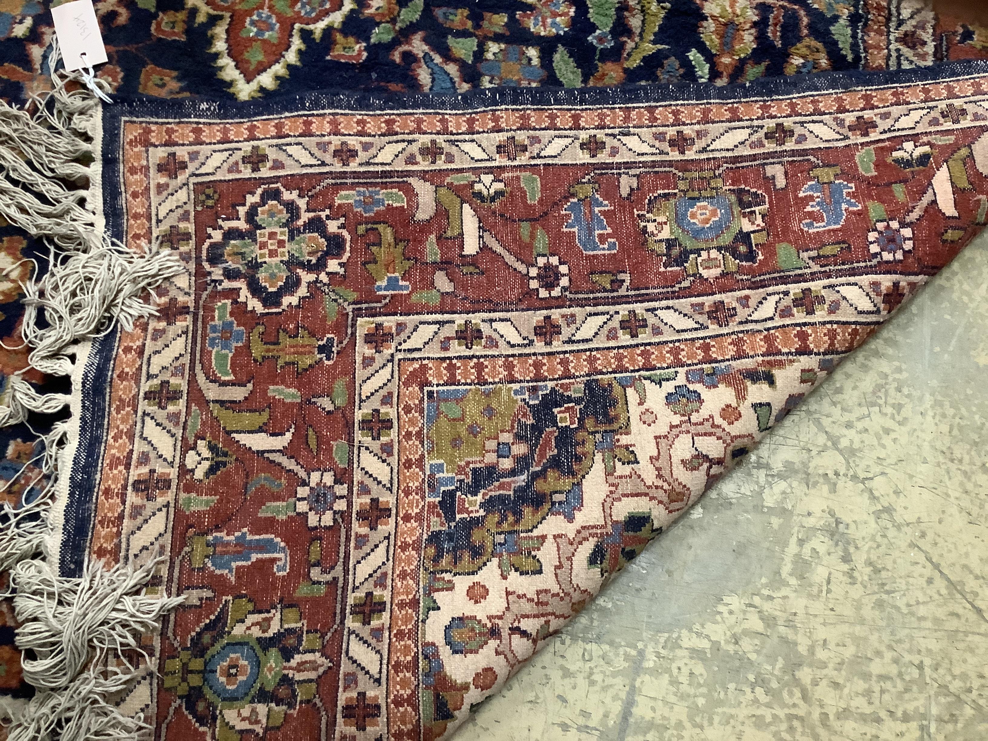 A Tabriz style ground rug, 216 x 156cm